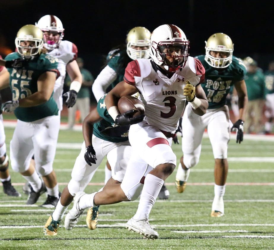 JSerra’s Chris Street gets past Poly’s defense as the Lion’s take on the Jackrabbits Friday, November 2, 2018 in Long Beach.  (Photo by Tracey Roman, Contributing Photographer)