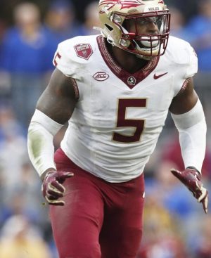 Nov 4, 2023; Pittsburgh, Pennsylvania, USA;  Florida State Seminoles defensive lineman Jared Verse (5) breaks off of the line of scrimmage against the Pittsburgh Panthers during the second quarter at Acrisure Stadium. Mandatory Credit: Charles LeClaire-USA TODAY Sports